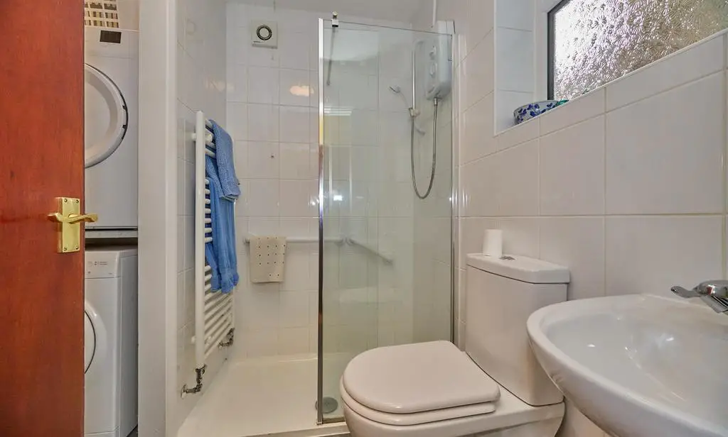 Refitted shower room/ utility room