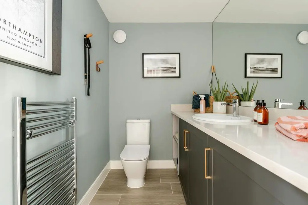 The combined cloakroom/utility is ideal for...