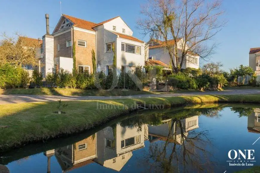 Casa de Condomínio com 5 Quartos à Venda, 400 m² por R$ 1.900.000 Arquipélago, Porto Alegre - RS