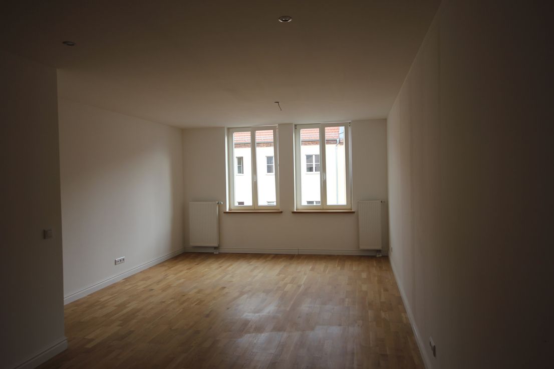 Wohnzimmer -- 2 Zimmer Neubauwohnung in Babelsberg mit Balkon