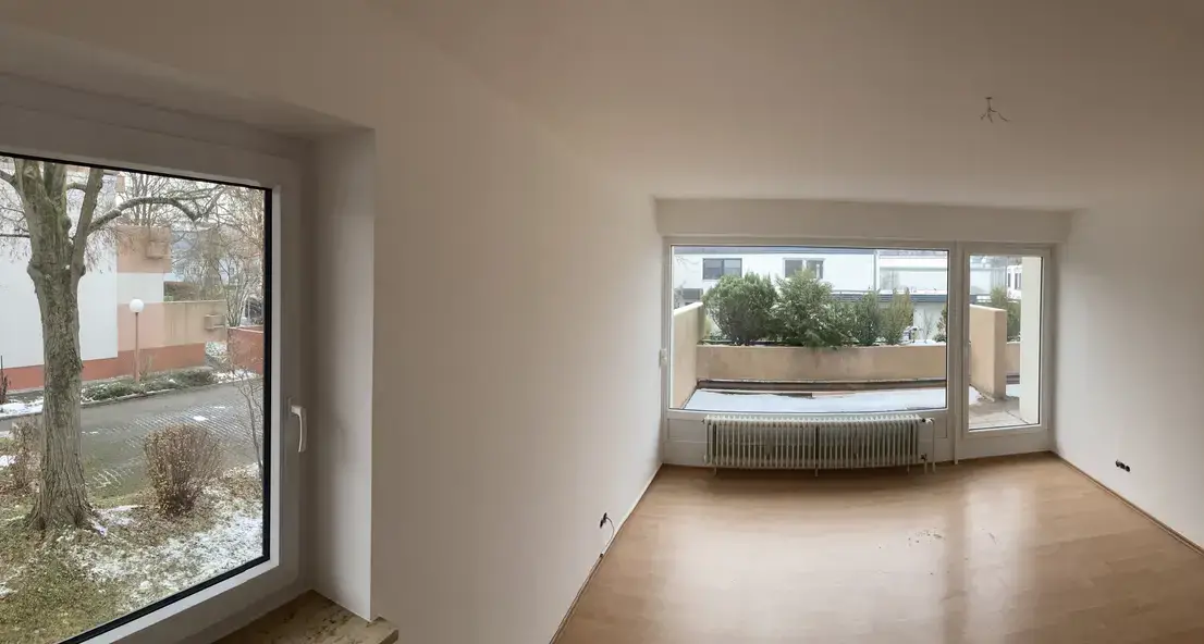 Wohnzimmer und Terrasse -- Erstbezug nach Sanierung: 3-Zimmer-Terrassenwohnung in Neusäß mit Stellplatz