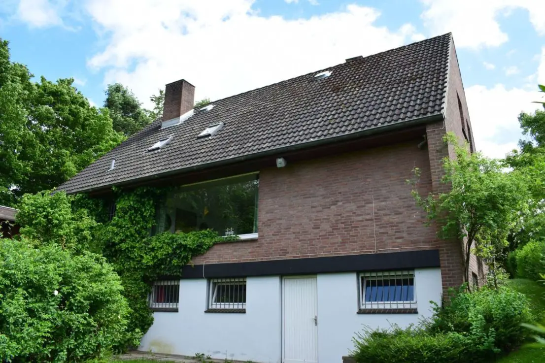 7798WI-15 Rückansicht -- Einfamilienhaus in Mielkendorf mit großem Grundstück und Blick auf die Eiderwiesen