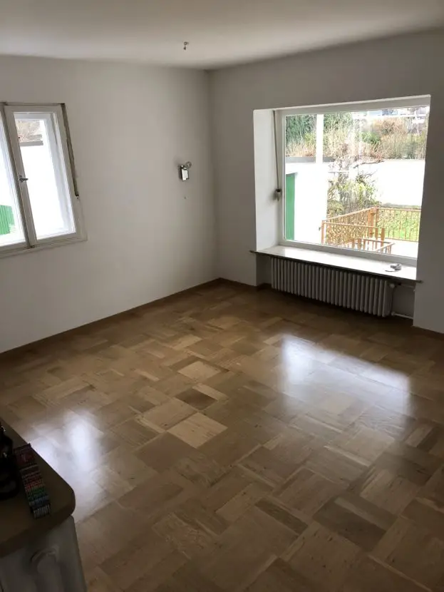 Wohnzimmer 1 -- Schöne DHH mit Garten in München-Freimann
