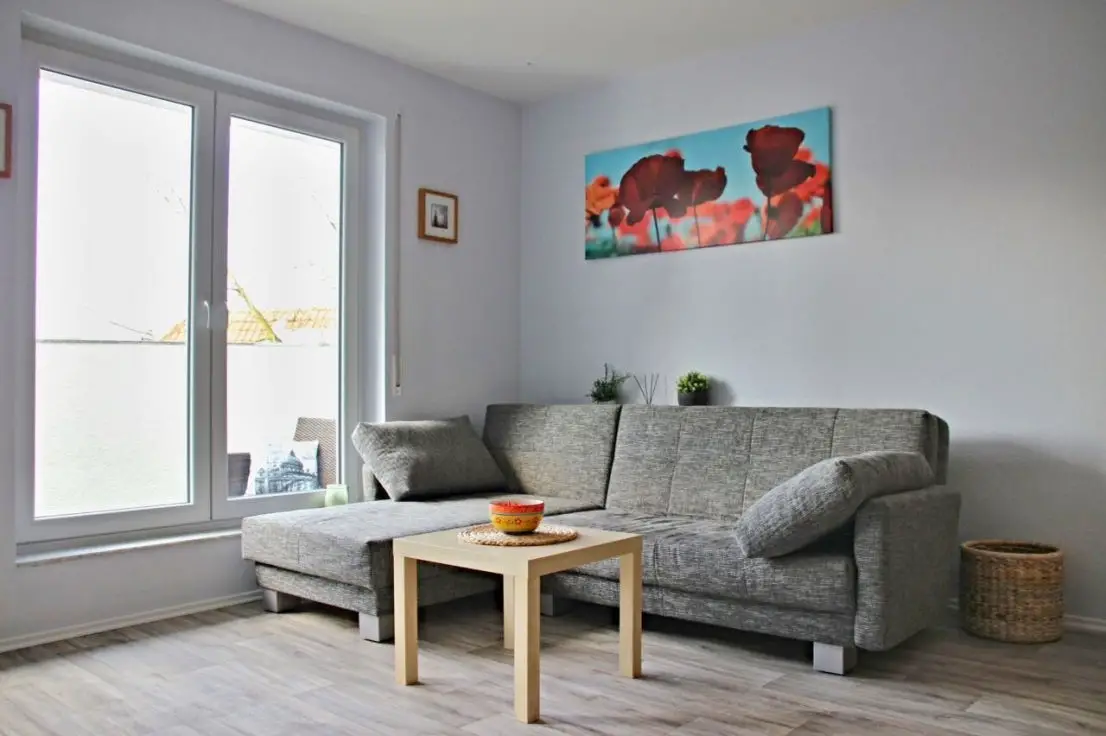 Wohnzimmer -- Traumhafte Maisonette ETW mit herrlichem Blick über Kilianstädten