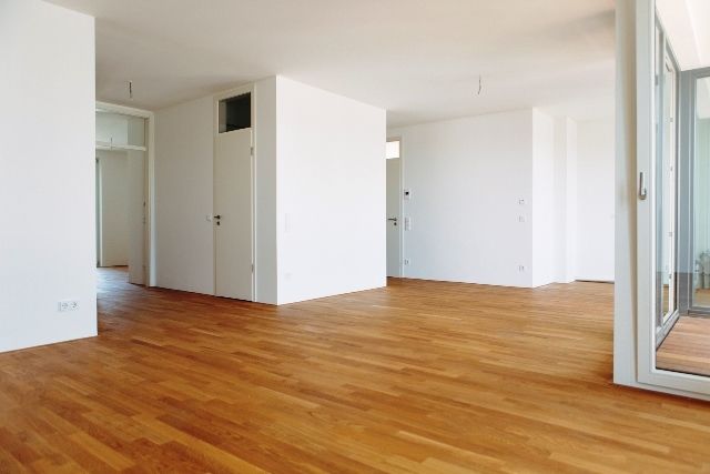 Wohnbereich -- Neubau / hochwertige Ausstattung / großer Balkon / Fußbodenheizung / Parkett / Tiefagarage