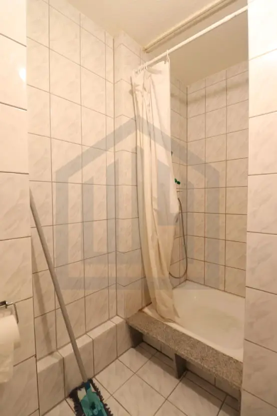 Dusche -- 1-Zimmer-Wohnung mit starker Rendite