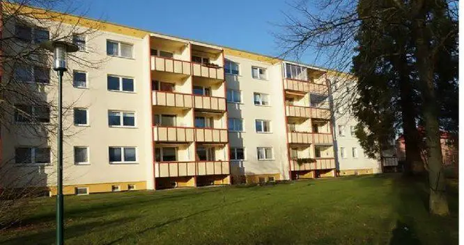 Außenansicht -- Erstbezug nach Sanierung mit EBK und Balkon: ansprechende 2,5-Zimmer-Wohnung in Dorf Mecklenbur