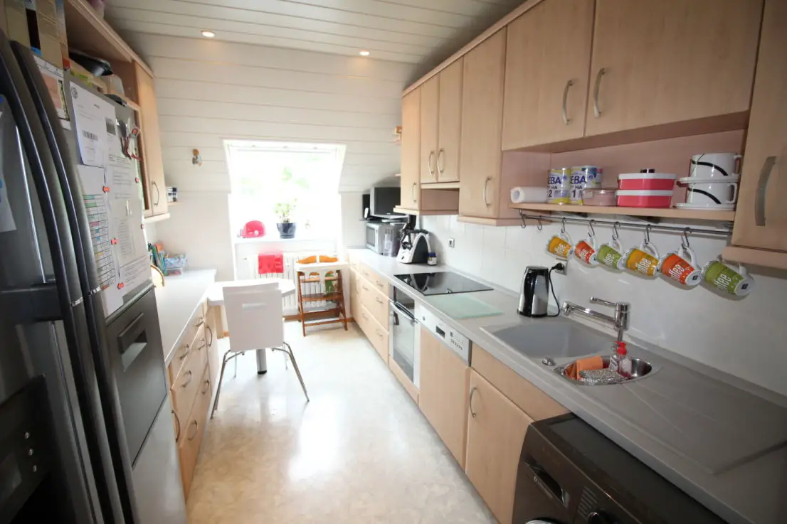 Küche -- Super gepflegt und familienfreundlich: Schicke Eigentumswohnung mit Balkon!