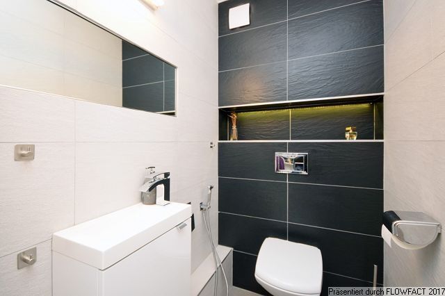 WC -- 3-Zimmer-Maisonette-Wohnung mit Südterrasse und Tiefgaragen-Stellplatz!