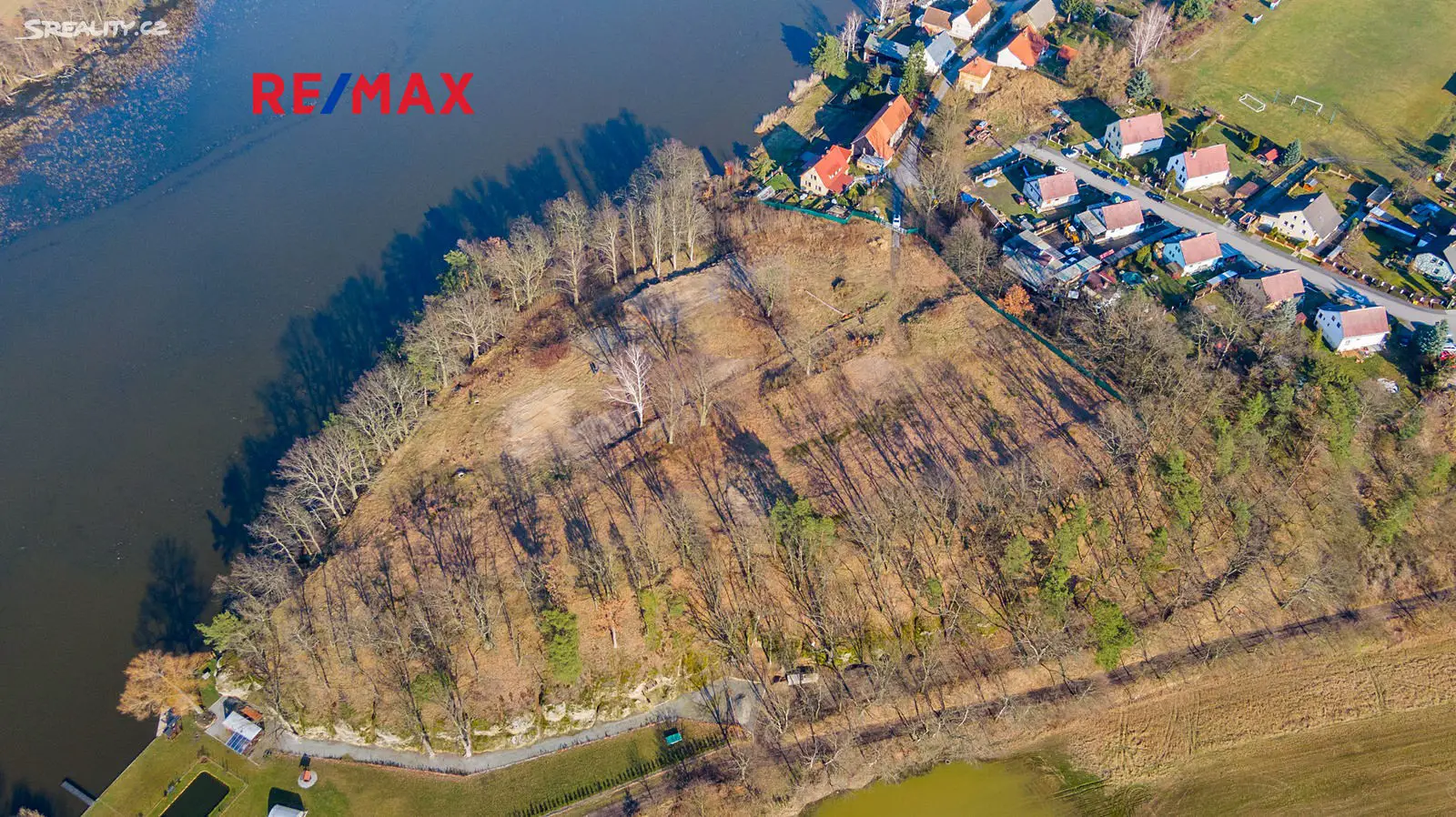 Prodej  stavebního pozemku 1 912 m², Holany, okres Česká Lípa
