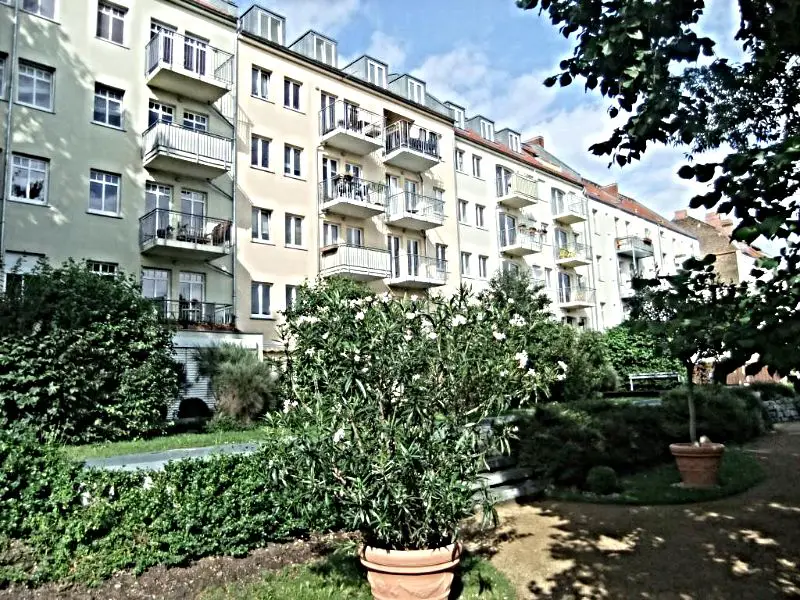 Fassadenansicht Gartenseite -- "Quartier Orangerie": Exclusive 3-Zimmer-Wohnung mit Sonnenbalkon