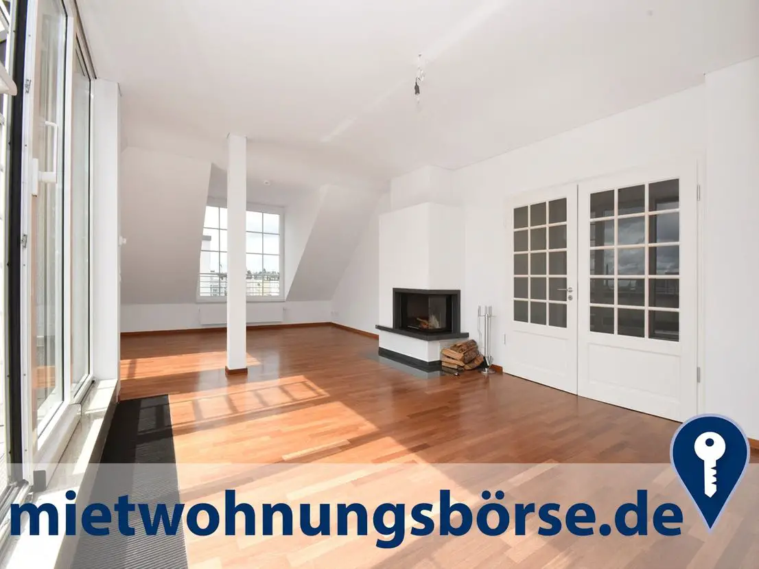 Wohnraum -- AIGNER - Rarität in begehrter Lage Münchens: Exklusive Dachgeschosswohnung mit Wellness-Bereich