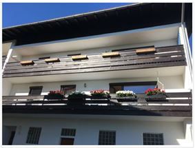 Aussenansicht Wohnung 1OG -- Modernisierte 3-Zimmer-Wohnung mit Balkon und EBK in Aschau im Chiemgau