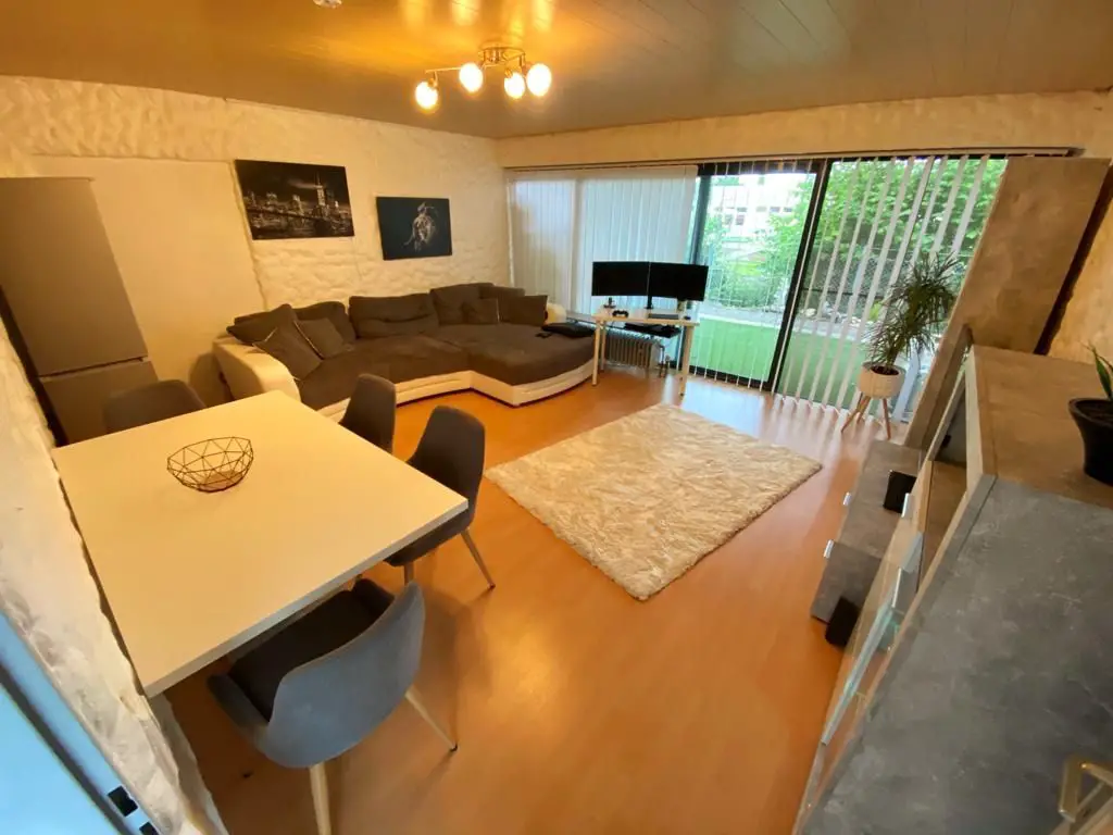 Wohnzimmer -- Geräumige 2-Zimmer-Wohnung mit Terrasse optimal geeignet für einen Einzelhaushalt