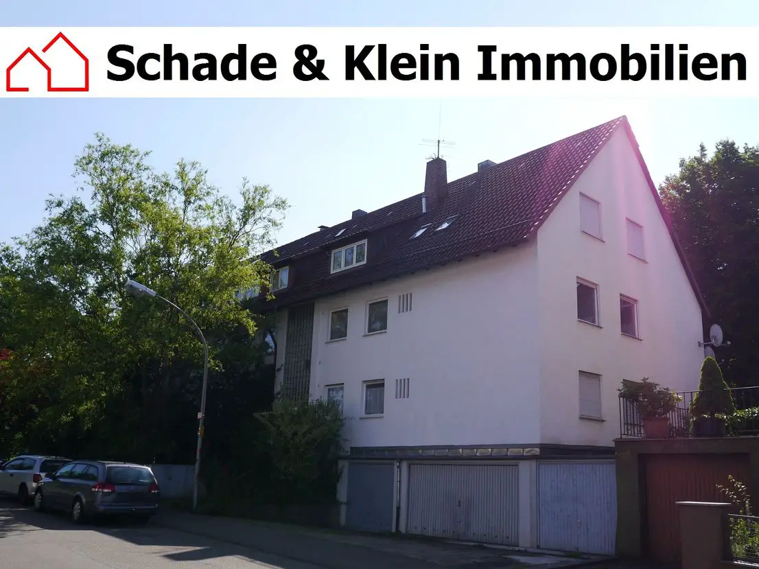 Hausansicht -- Mehrfamilienhaus mit 6 Wohneinheiten und 4 Garagen in Stuttgart