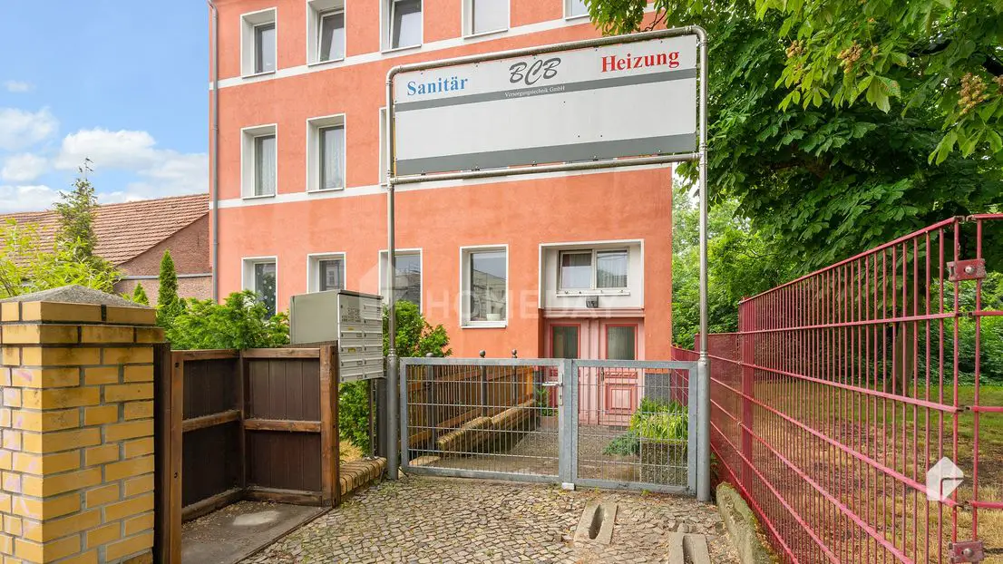 Außenansicht 8 -- Vollvermietet und gut angebunden – Gepflegtes MFH m. 6 Wohnungen und Gewerbe in Französisch Buchholz