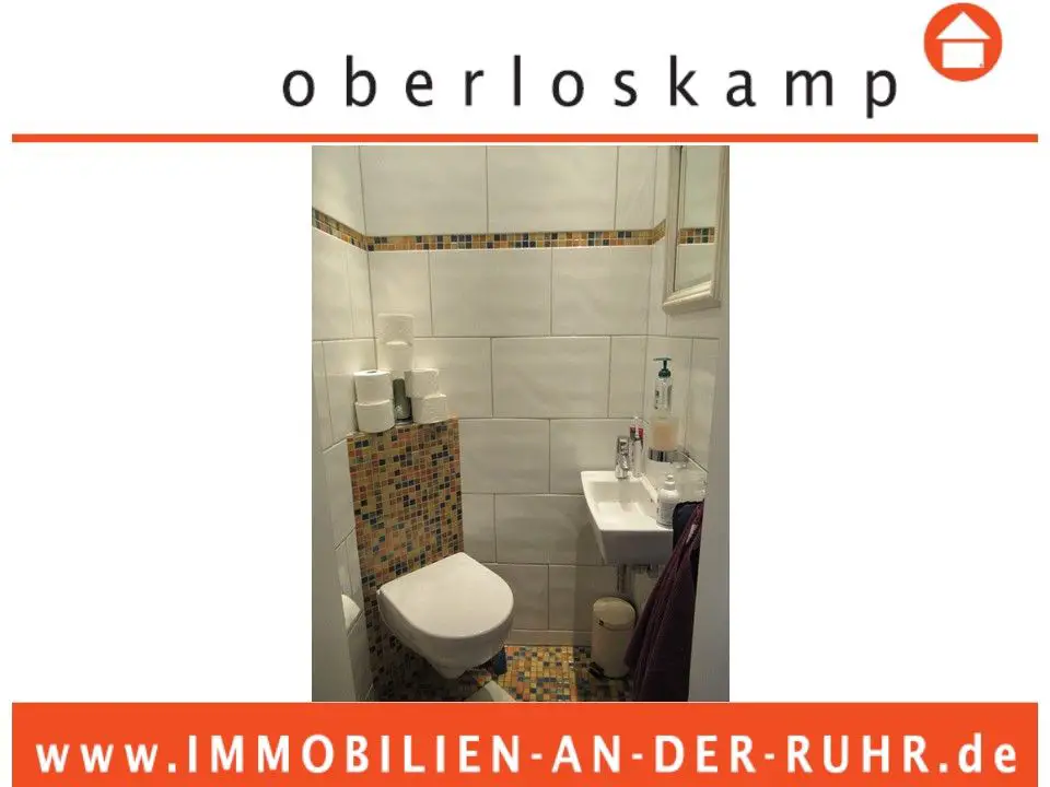 Gäste-WC -- Charmantes, einseitig angebautes EFH mit Doppelgarage und pflegeleichtem Grundstück am Uhlenhorst