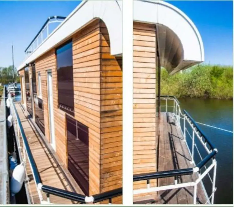 Hausboot -- Modernes, hochwertiges Hausboot - Wohnen und Leben auf dem Wasser