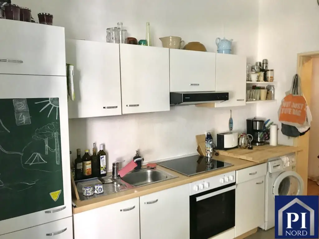 Moderne Einbauküche mit Was... -- Schön geschnittene 3 Zimmer Wohnung am Schrevenpark mit Balkon! Kapitalanlage - Vermietet