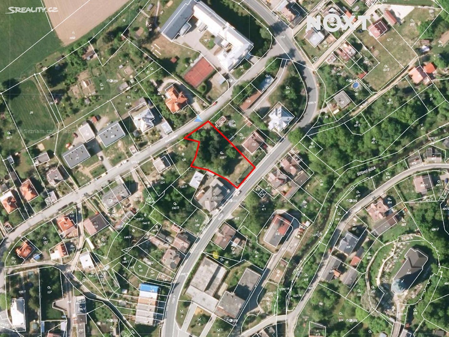 Prodej  stavebního pozemku 1 453 m², Hlavní, Žulová