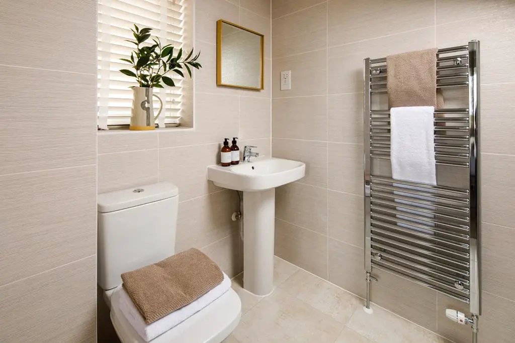 The ensuite features a double shower enclosure