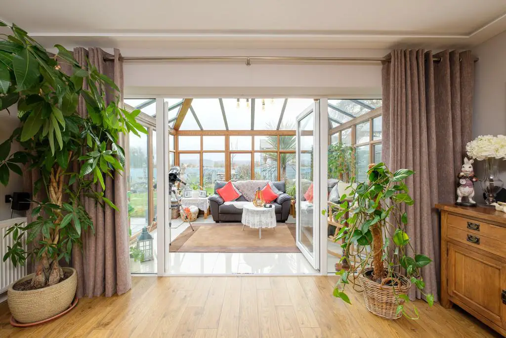 Generous conservatory off sitting room