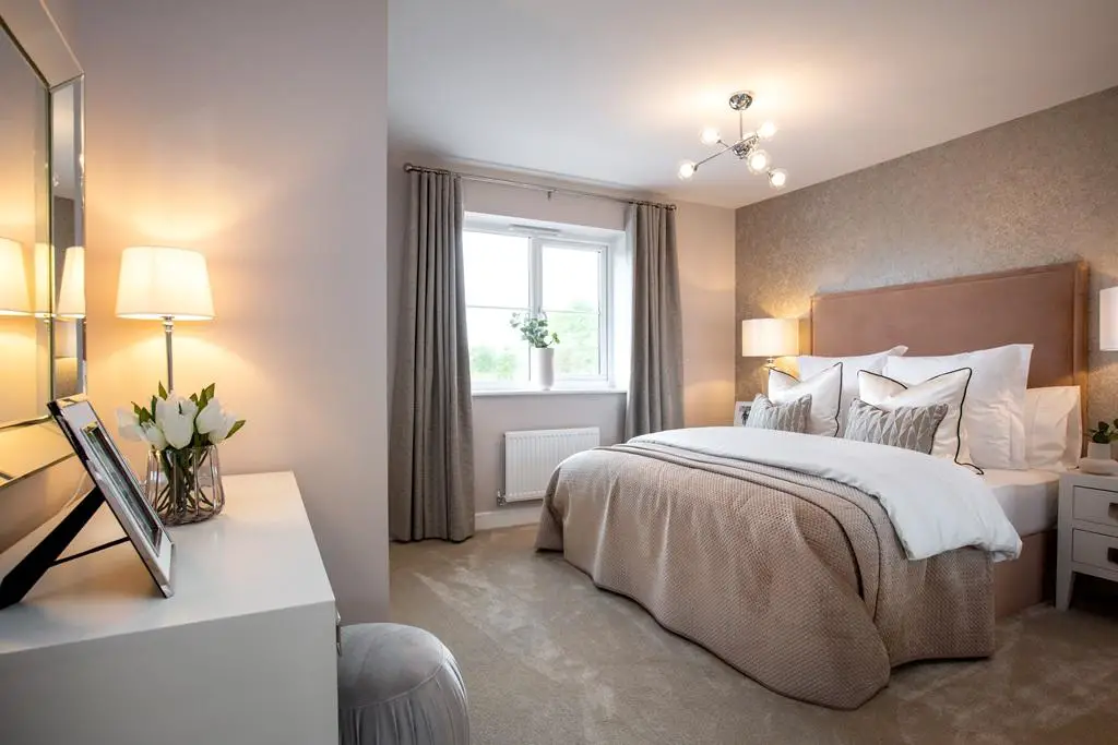 Escape to the beautiful main bedroom for peace...