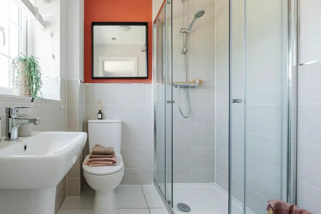 The en suite is well proportioned and features...