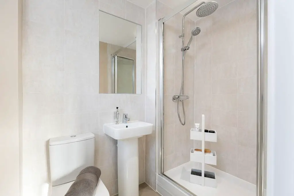 An en suite shower room takes away the stress...