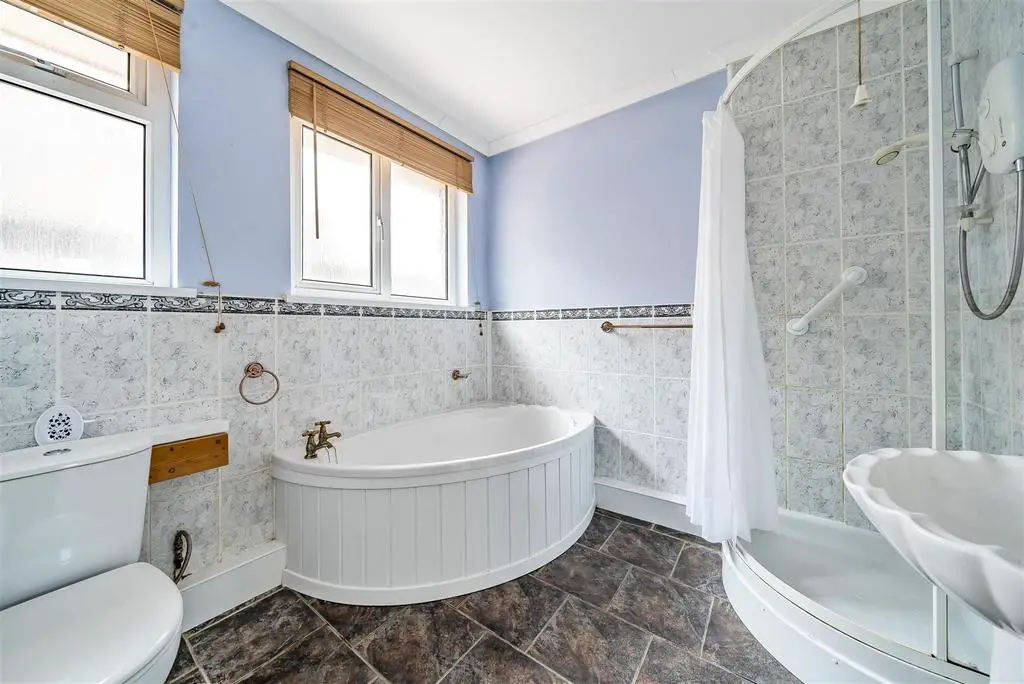 Family Bathroom with additional shower cubicle