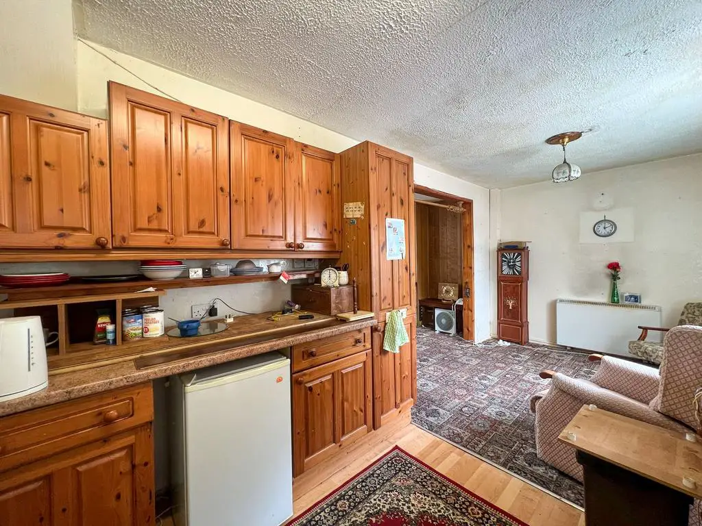 Kitchen leading into Dining Area