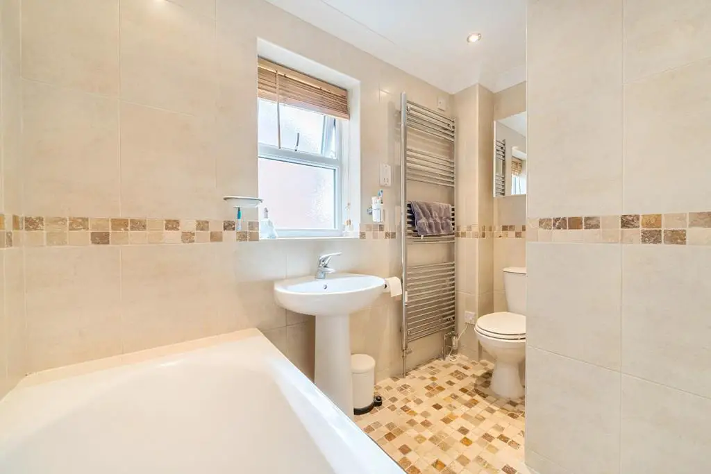 BATHROOM with separate shower over bath.jpg