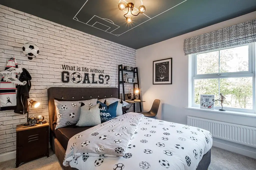 Football themed double bedroom in an Exeter home