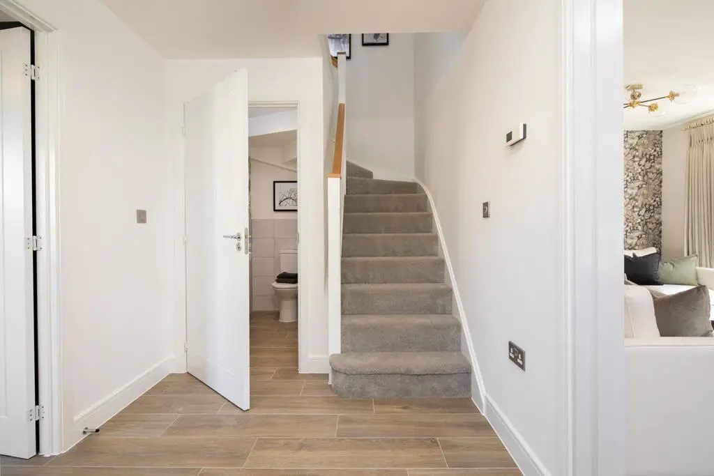Bright hallway with downstairs toilet
