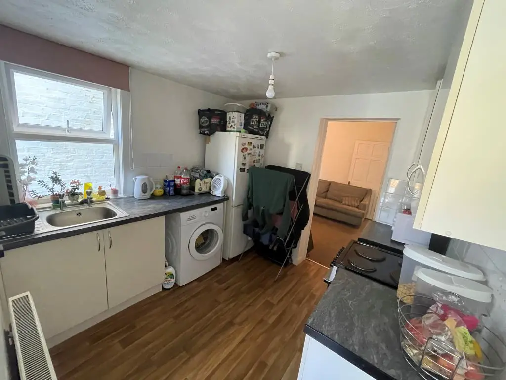 Kitchen with fitted units and access to dining roo