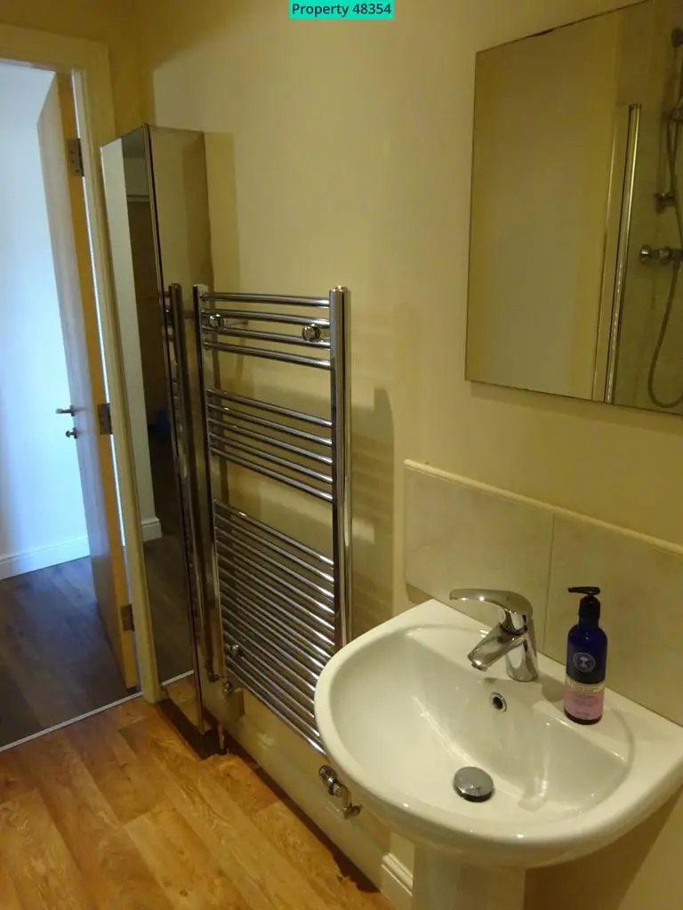 Heated towel rail and unit