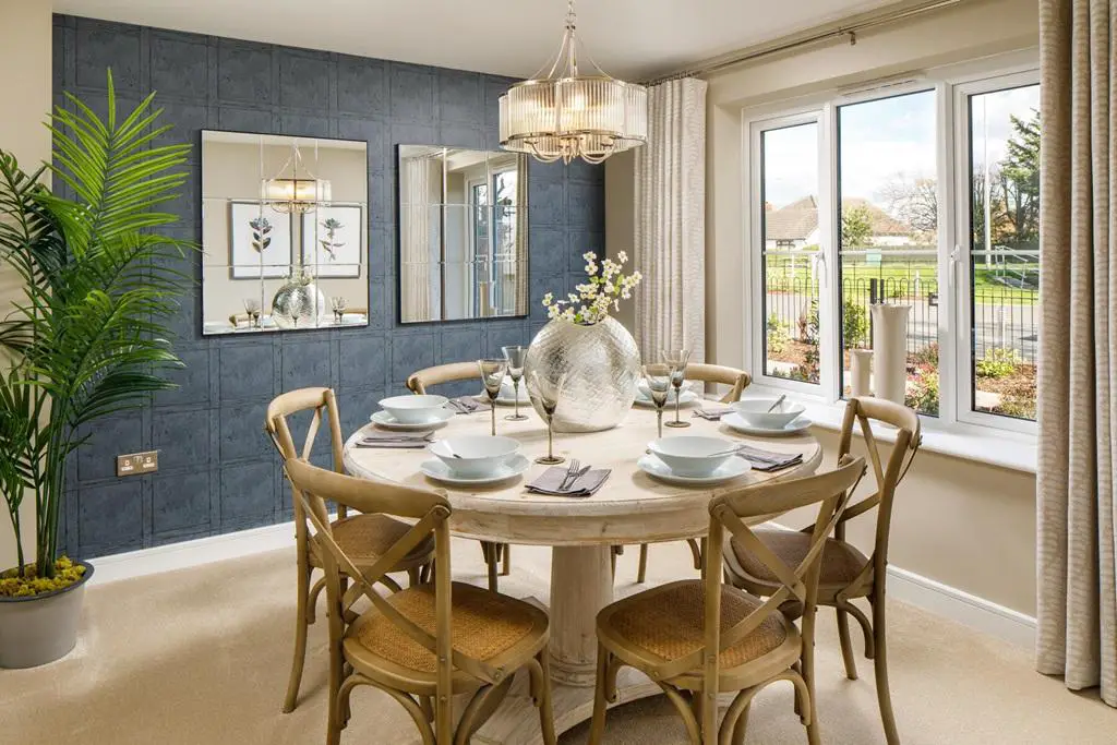 A separate dining area for hosting dinner with...