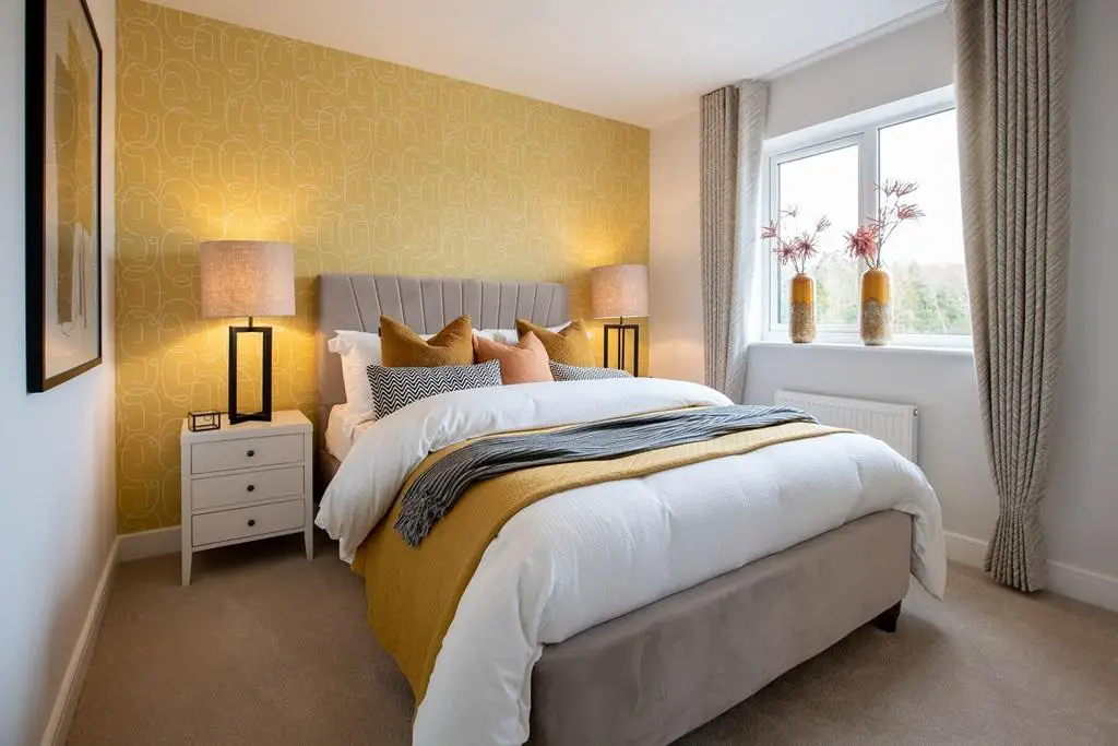 The main bedroom offers plenty of space to...