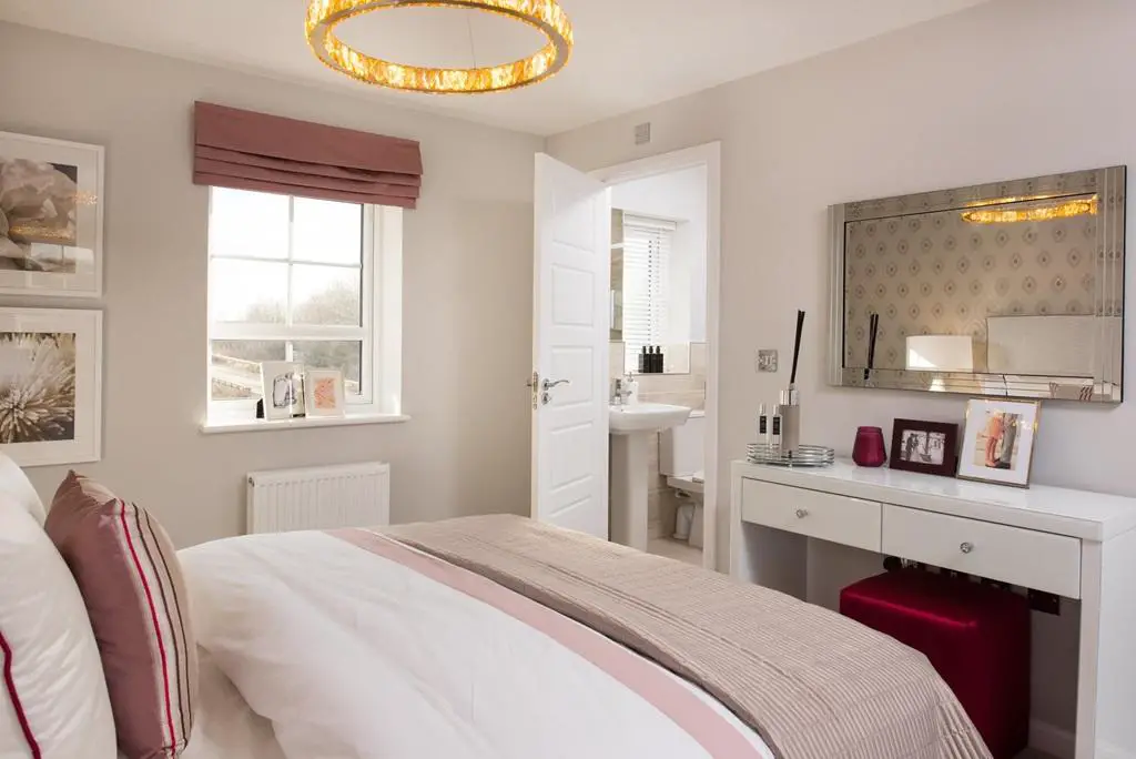 En suite main bedroom in the Alderney 4 bedroom...