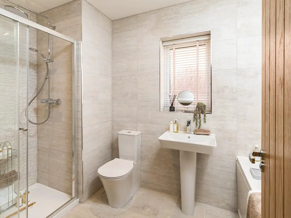 Main family bathroom with shower and separate...
