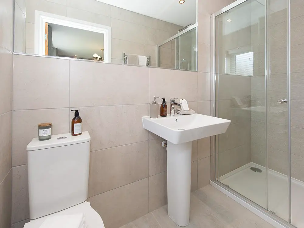 En suite shower room with Porcelanosa tiles