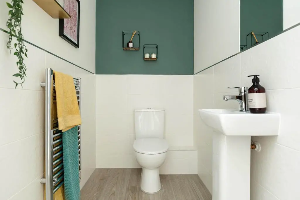 A guest cloakroom completes the ground floor