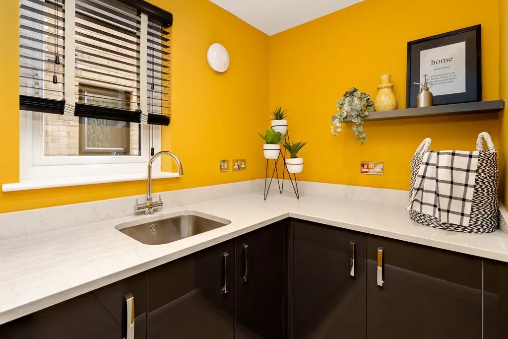 The utility room offers extra storage space