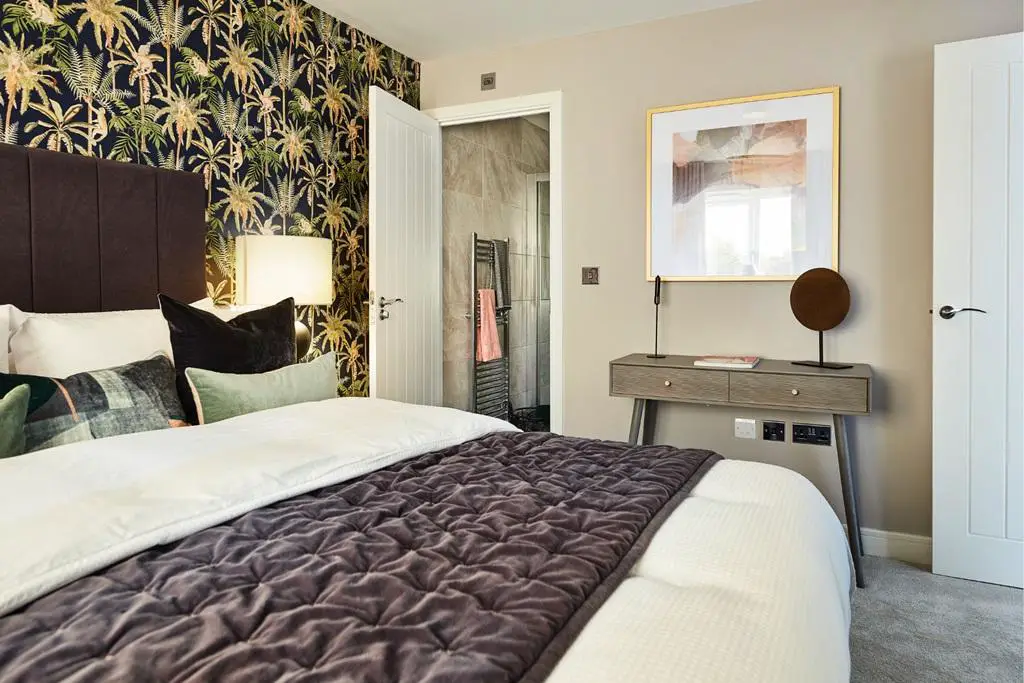 The main bedroom features a private en suite