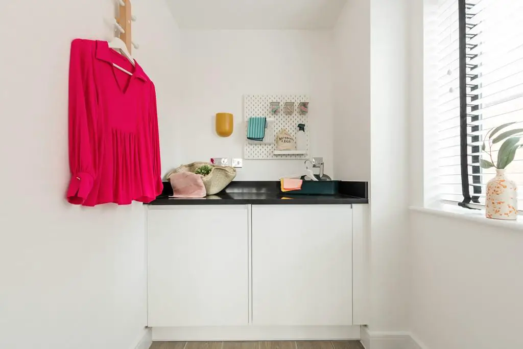 A utility room keeps the appliances out of the way