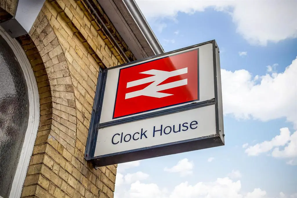 Clock house station sign