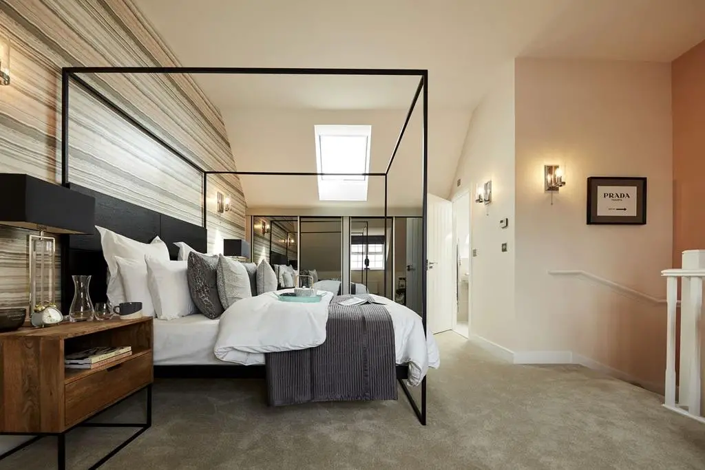 King size bedroom enjoys privacy on the second...