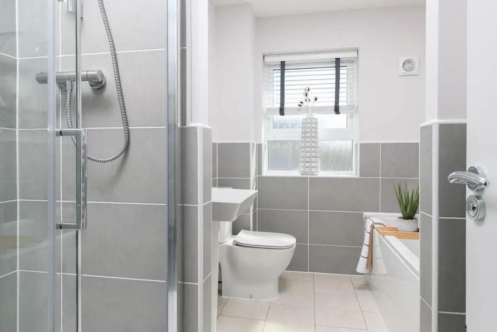 Family bathroom with separate shower, bath,...