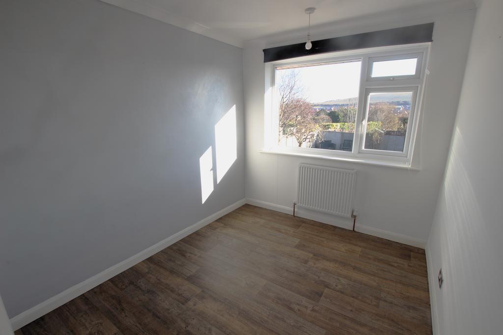 Bedroom three with views of Windmill Hill