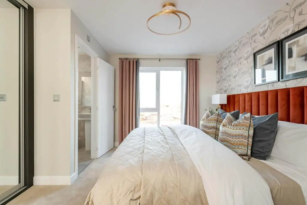A spacious main bedroom is the perfect place to...
